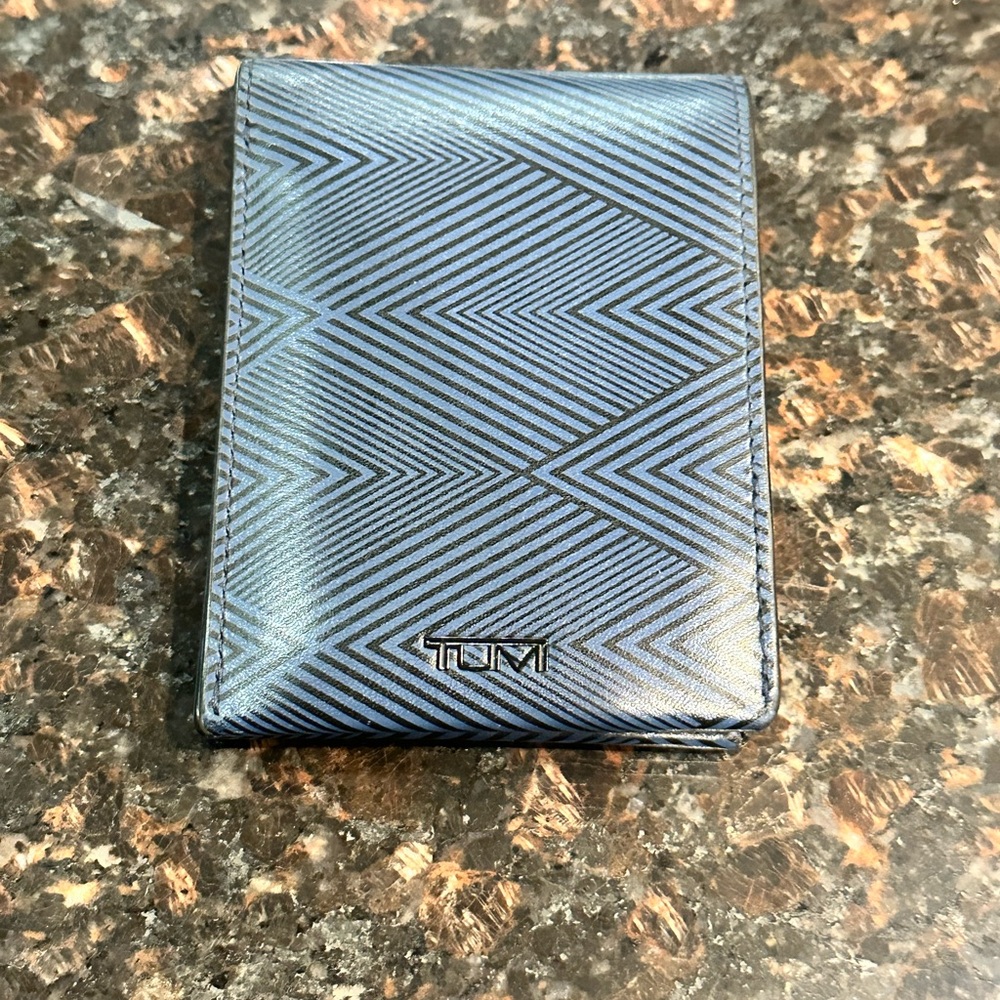 Tumi Nassau Global Double Bifold Black/Blue Wallet
Like New